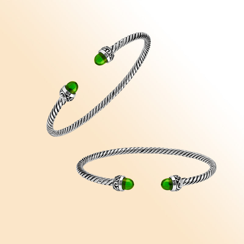 Handcrafted Sterling Silver Twisted Cable Bangle With Green Peridot Quartz and Oxidized Balinese Carvings.