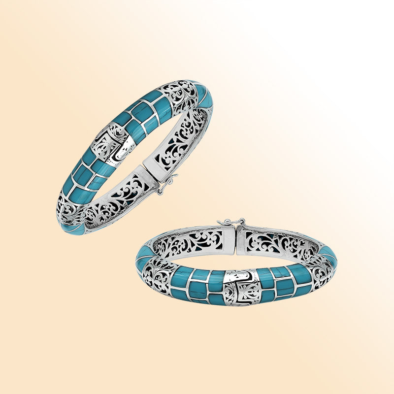 Handcrafted sterling silver turquoise shell inlay hinged bangle with filigree accents made in Bali.
