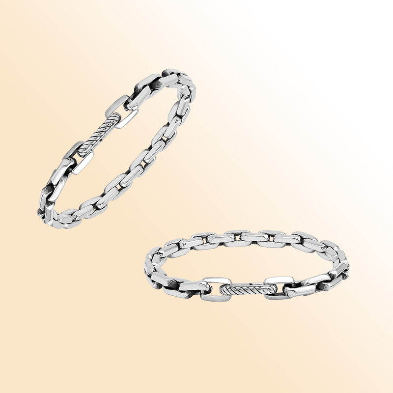 A handcrafted sterling silver polished-link bracelet featuring a secure Carabiner Lock, smooth reflective finishing, and clean modern styling ideal for everyday minimalistic wear.