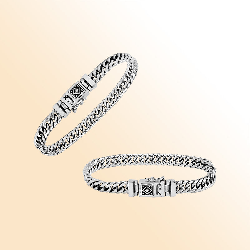 Sterling Silver chain bracelet showcasing an artistic tribal clasp motif and a high-gloss polished surface that creates an elegant, expressive, and timeless accessory suitable for any style preference.