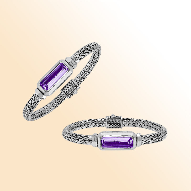 Sterling silver bracelet featuring an amethyst quartz baguette with a handwoven Balinese chain and oxidized finish.
