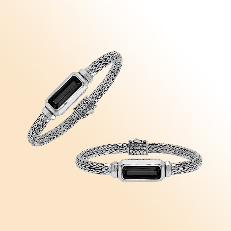 Sterling Silver woven bracelet showcasing a deep Black Onyx rectangular motif, finished with a bright mirror polish to provide expressive contrast and refined handcrafted detail.