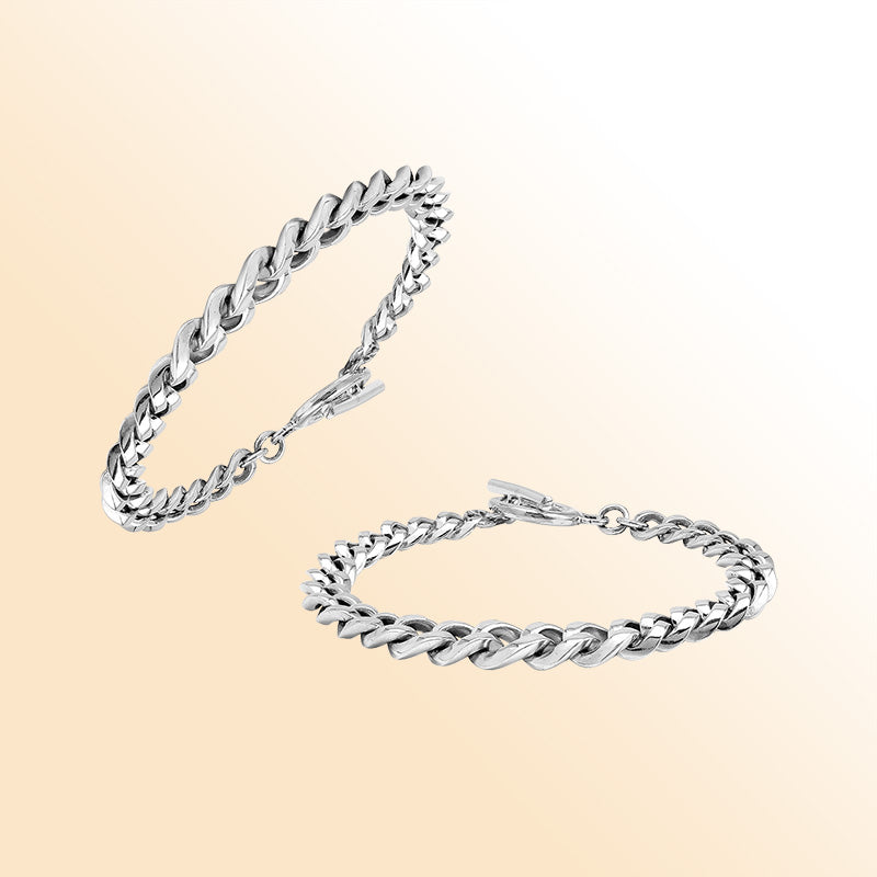 Sterling Silver bold curb chain bracelet with a polished toggle closure and high-gloss finish, offering expressive shine and refined handcrafted detail.