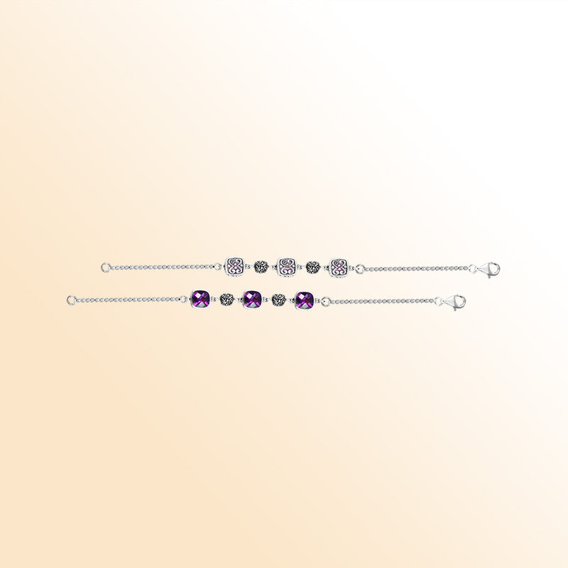 Elegant sterling silver bracelet featuring cushion-cut Amethyst quartz stones paired with artisan silver detailing, a smooth 2.5MM chain, and a secure lobster lock.