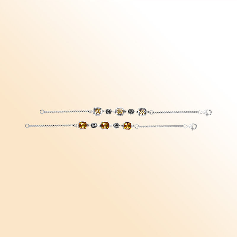 Sterling silver bracelet with citrine quartz cushion stones and handcrafted Bali filigree accents.