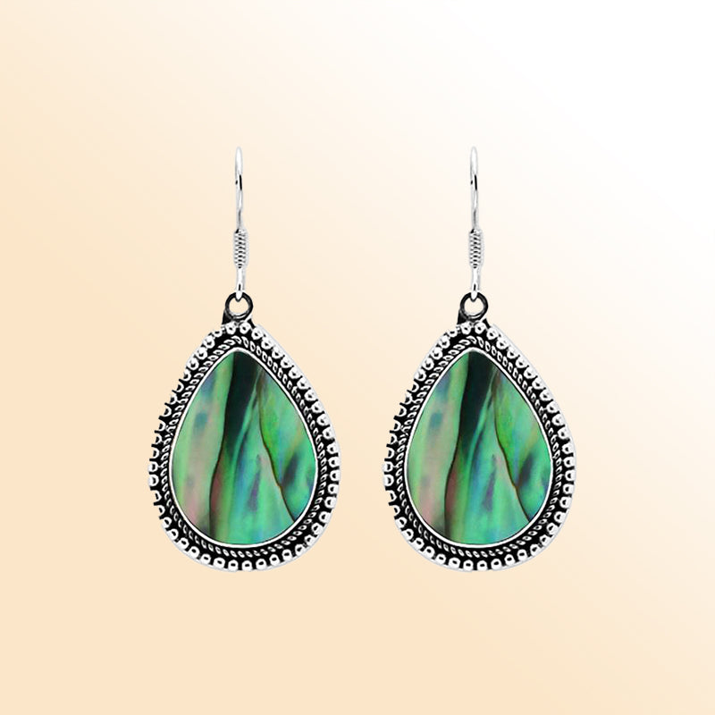Sterling silver teardrop Abalone earrings with shimmering iridescent shell and detailed Bali beaded design, handcrafted artisan jewelry for women.