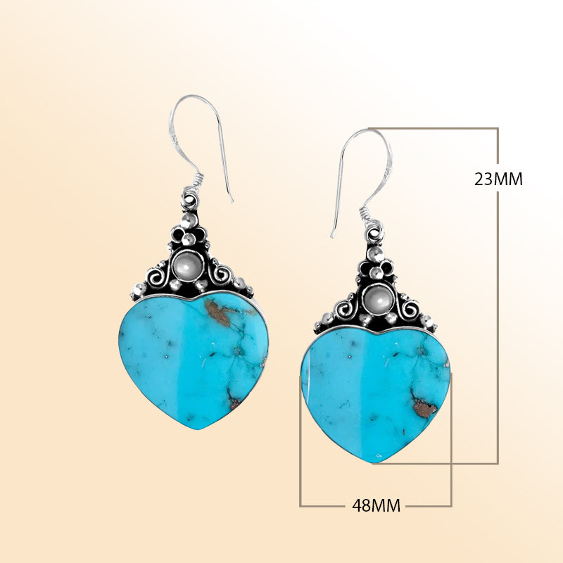 Sterling silver turquoise heart earrings with pearl accents, handmade in Bali
Elegant turquoise heart earrings with pearls, perfect gift for women