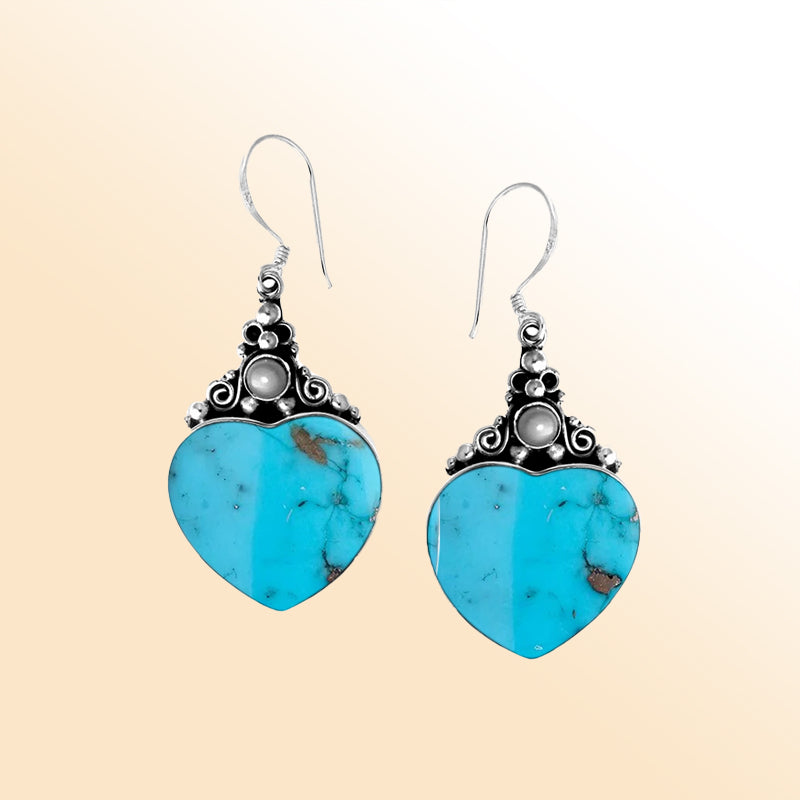 Sterling silver turquoise heart earrings with pearl accents, handmade in Bali
Elegant turquoise heart earrings with pearls, perfect gift for women