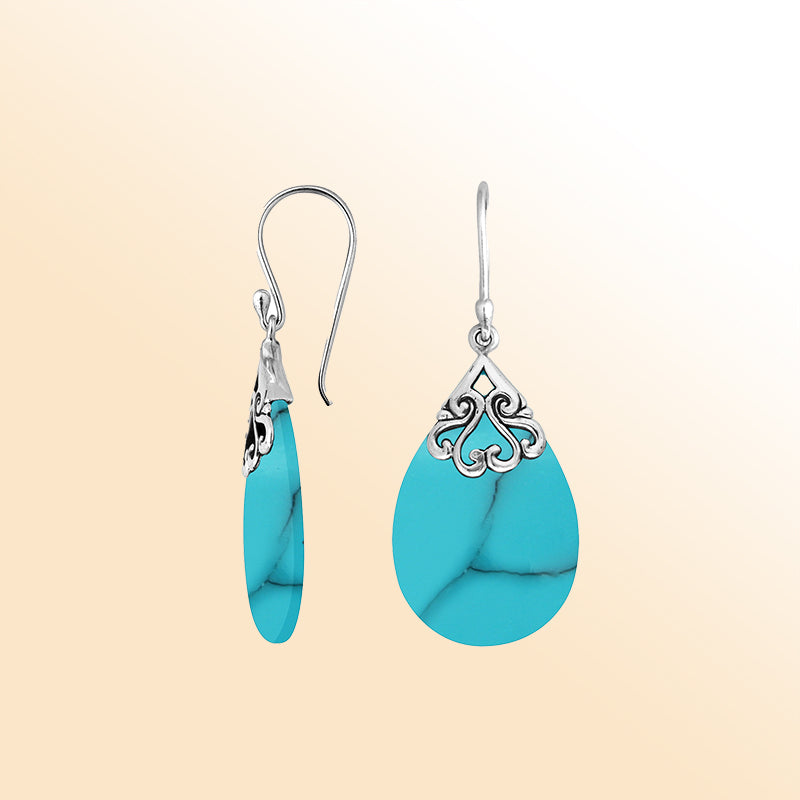 Sterling silver turquoise teardrop earrings with scroll accent for women