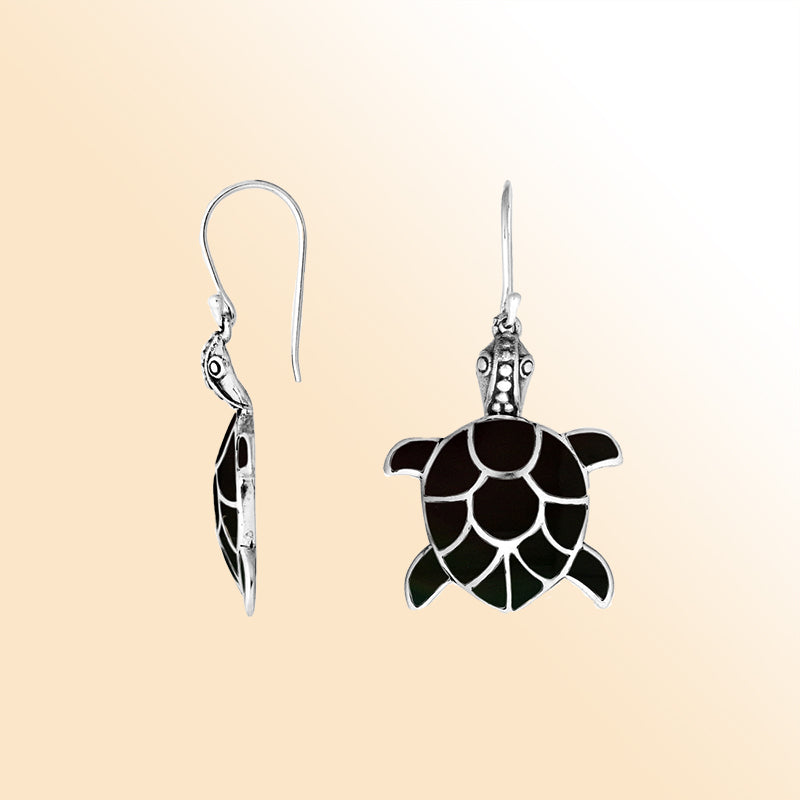 Sterling silver turtle earrings with sleek black shell inlay and artisan silver detailing
