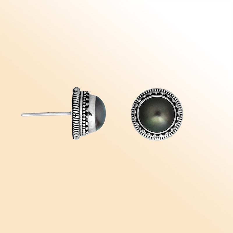 Silver stud earrings featuring Gray Pearls with ornate dotted Bali detailing.
