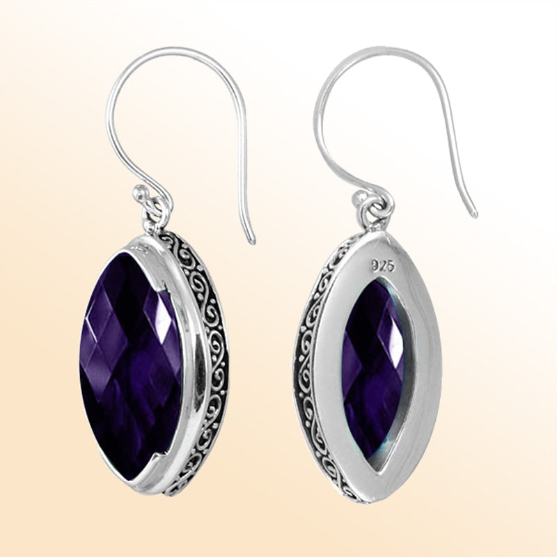 Sterling silver artisan marquise drop earrings featuring Amethyst Quartz with detailed silverwork and earwire lock.