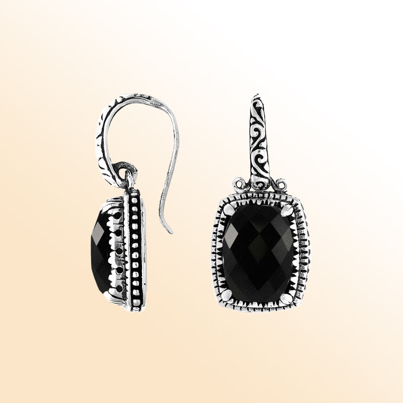 Sterling silver cushion-shaped artisan earrings with Black Onyx and carved detailing.