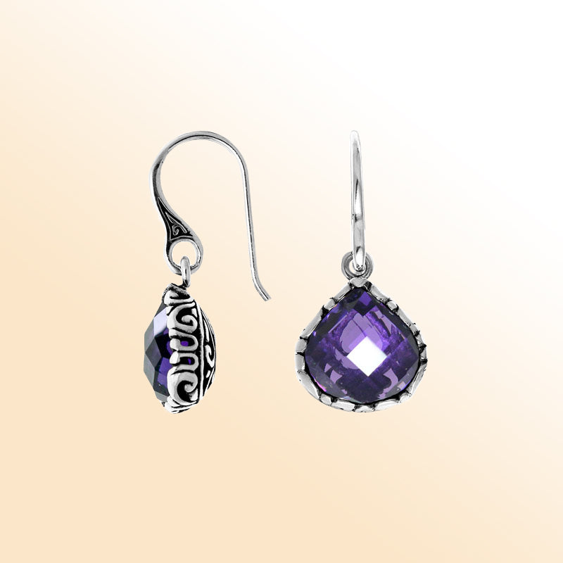 Sterling silver artisan teardrop earrings with Amethyst Quartz and carved detailing.