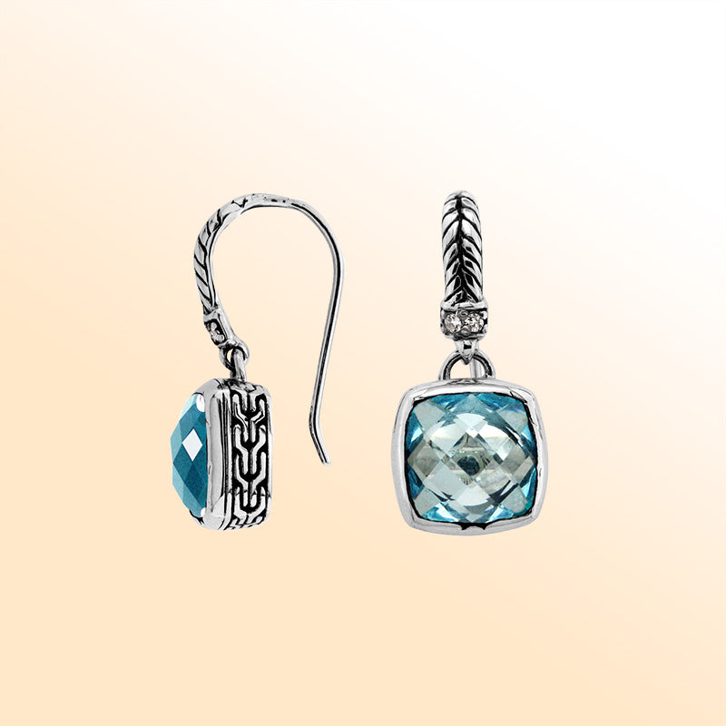 Handcrafted sterling silver drop earrings featuring Blue Topaz Quartz and Cubic Zirconia