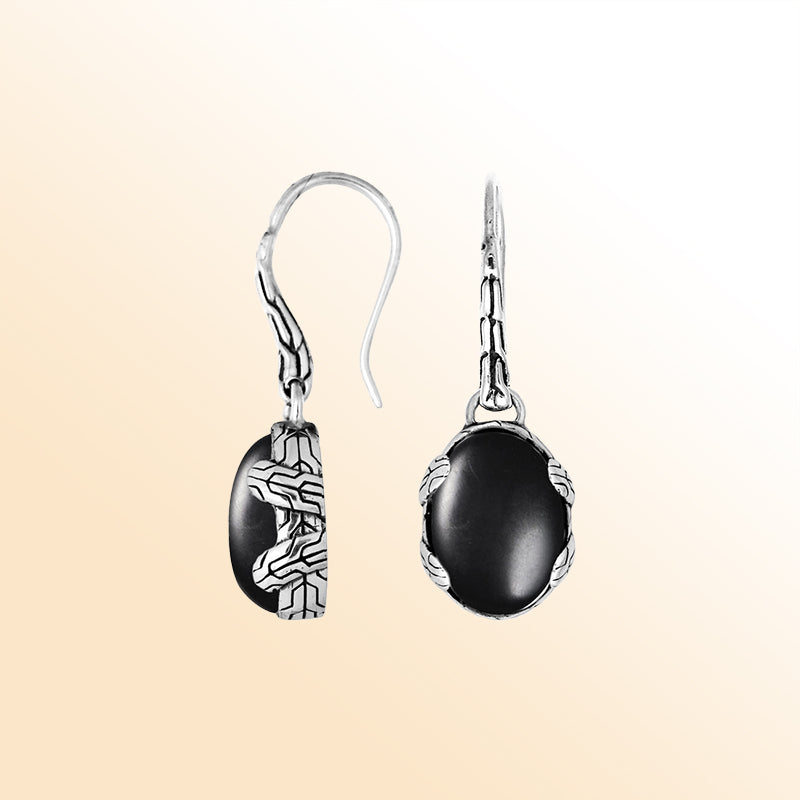 Handcrafted sterling silver Black Onyx oval drop earrings with antique oxidized texture and earwire lock for elegant wear.