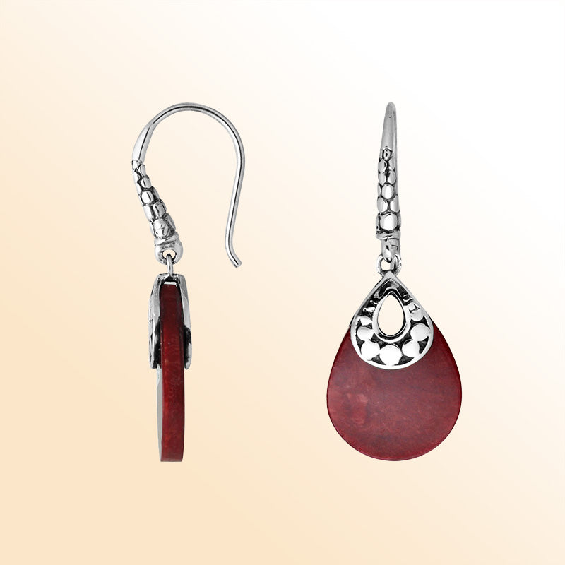 Handcrafted sterling silver Red Coral pear-drop earrings with antique oxidized finish and elegant earwire.