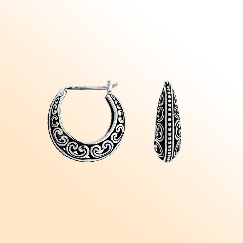Artisan Sterling Silver swirl-pattern hoop earrings with oxidized detailing and beaded accents.