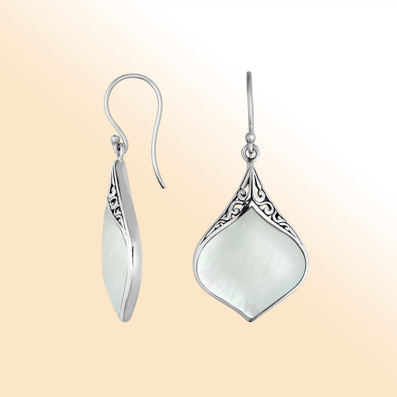 Artistic teardrop earrings with Mother Of Pearl and silver filigree work