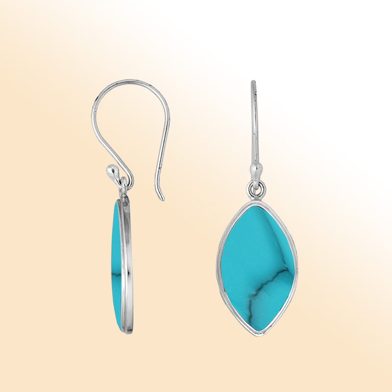 Artisan marquise earrings showcasing bold Turquoise Shell set in polished handcrafted sterling silver.
