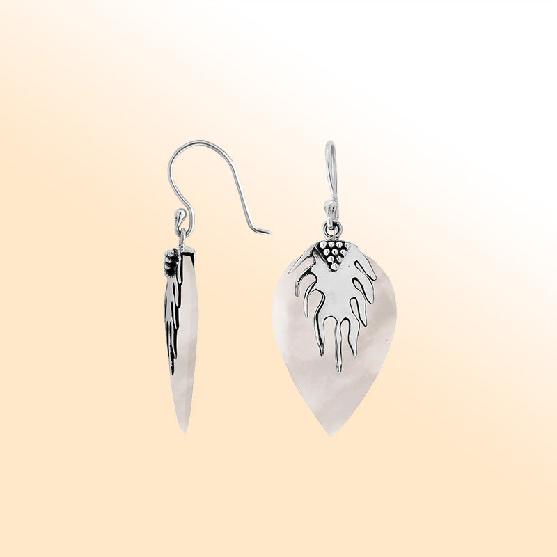 Artisan sterling silver leaf earrings with glowing Mother Of Pearl and polished handcrafted detailing.