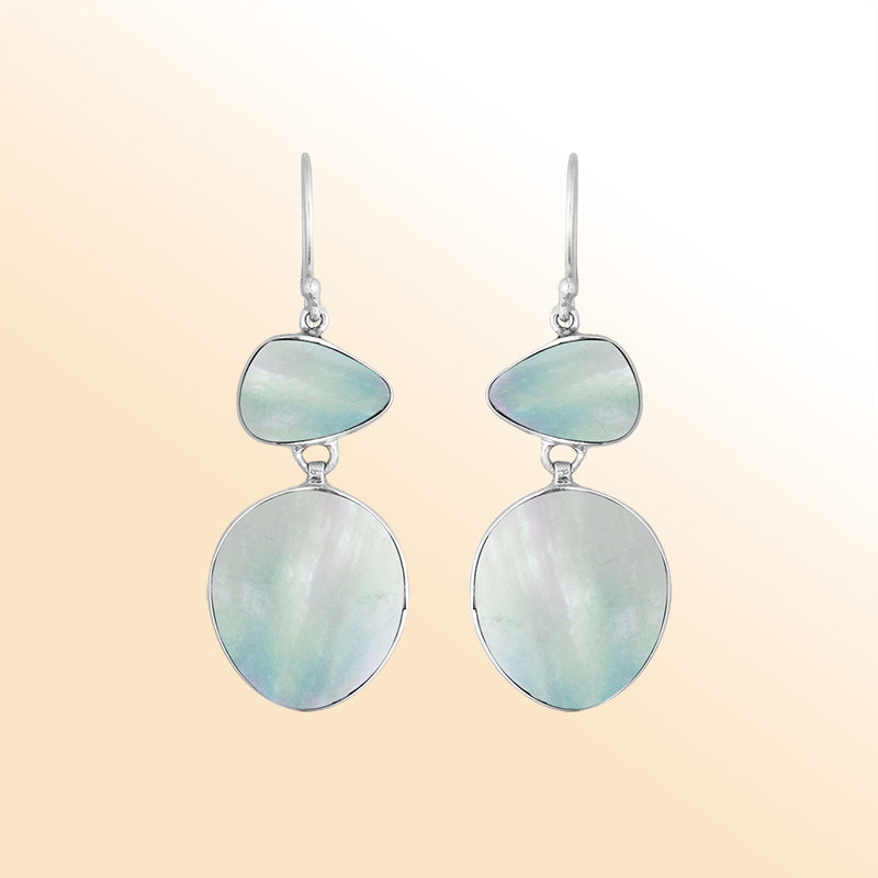 Artisan sterling silver double-drop earrings featuring soft iridescent Mother Of Pearl with polished handcrafted detailing.