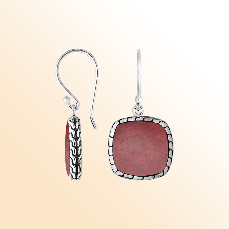 Artistic cushion earrings with Red Coral and silver textured edging