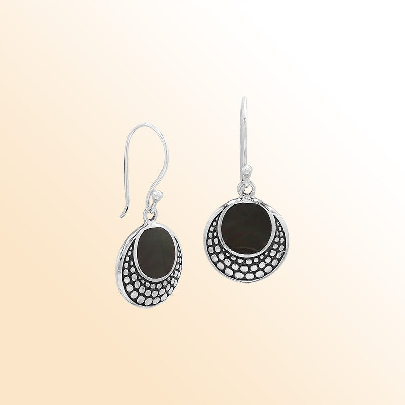 Sterling silver earrings with round Black Shell inlay and dotted silver detailing.