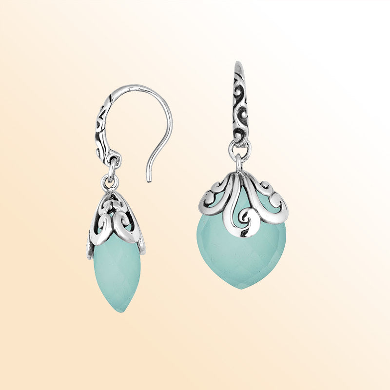 Sterling silver earrings with Green Chalcedony Quartz teardrop design and ornate silver detailing.