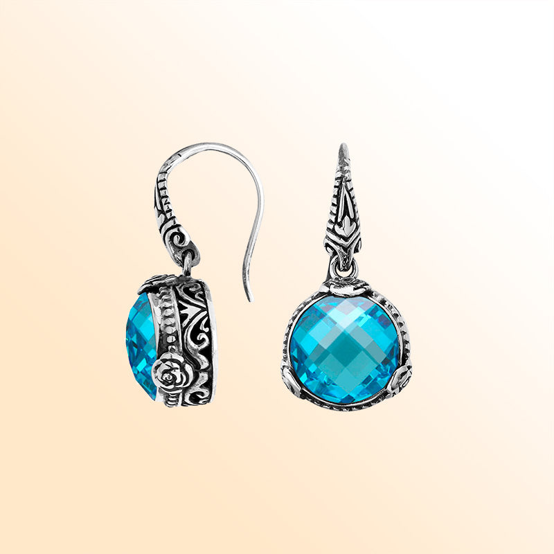 Sterling silver Blue Topaz Quartz earrings with vintage floral design and earwire lock.