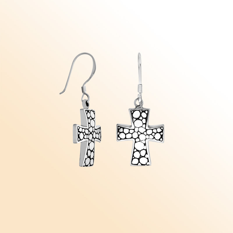 Sterling silver Bali textured cross earrings featuring polished–oxidized detailing and comfortable earwire hooks, created for those who appreciate symbolic, expressive, and handcrafted jewelry designs.