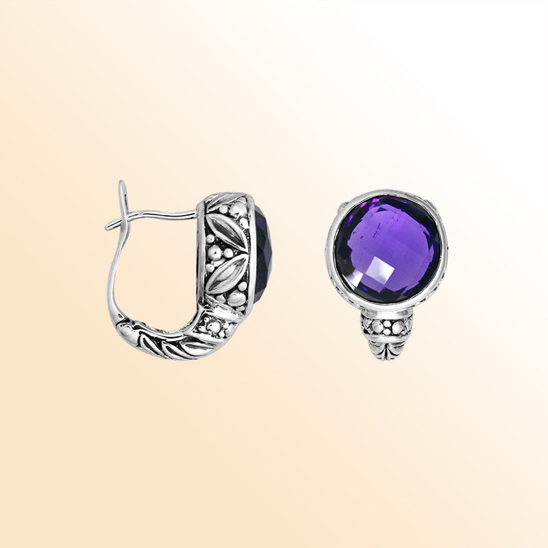 Sterling silver artisan earrings showcasing faceted amethyst quartz framed with ornate Balinese-inspired detailing, designed to deliver expressive, elegant, and comfortable everyday wear with secure omega clip closure.