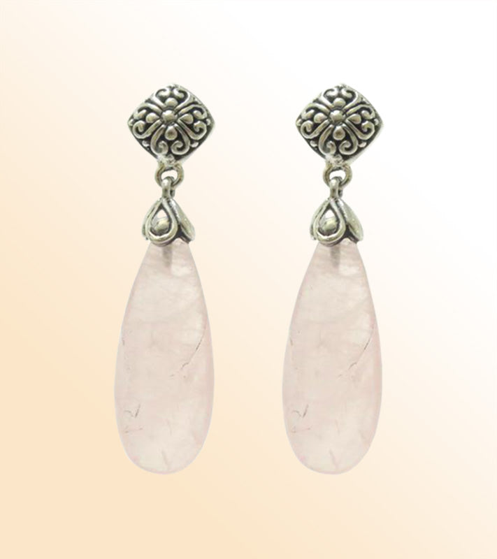Sterling silver earrings featuring soft pink Rose Quartz teardrops paired with ornate Bali-style tops, crafted for consistent quality and elegant presentation in wholesale jewelry assortments.