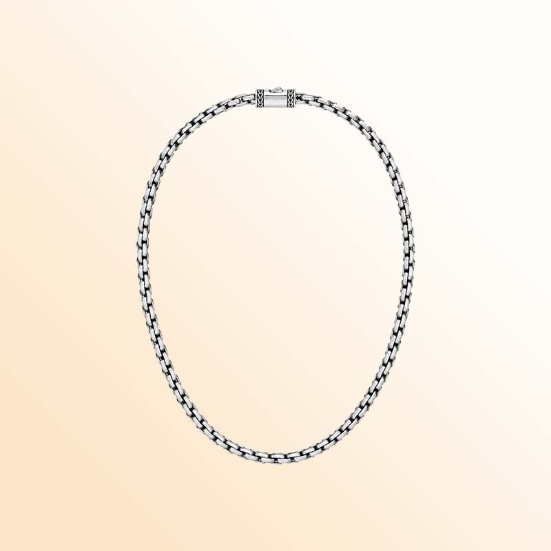 Bali-inspired sterling silver round box chain necklace with precisely connected geometric links, contrasting oxidized accents, polished silver highlights, and an artisan push clasp.
