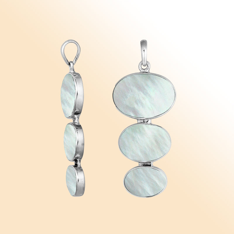 Handcrafted sterling silver pendant with three oval Mother of Pearl , luminous Bali jewelry for elegant everyday wear.