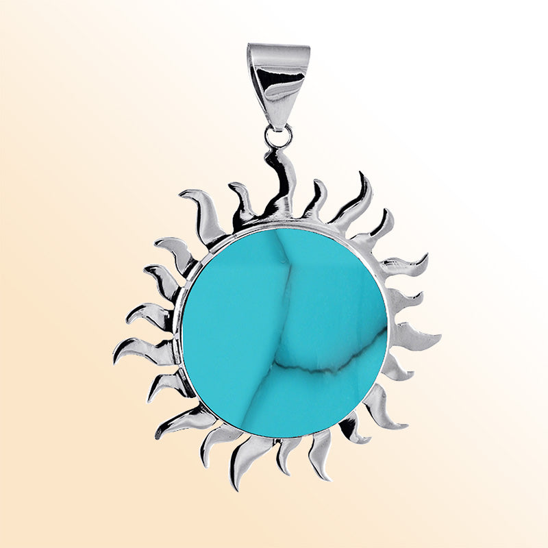 Handcrafted sterling silver sun pendant with vibrant Turquoise Shell, artisan Bali jewelry for bold everyday style.