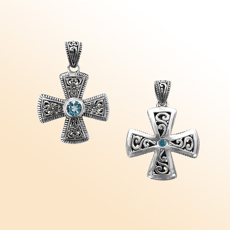 Sterling silver cross pendant with Blue Topaz gemstone – handcrafted Bali jewelry symbolizing faith, elegance, and timeless style