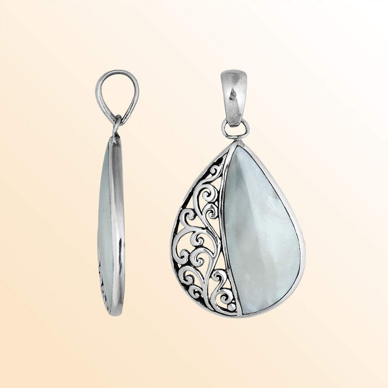 Sterling silver teardrop pendant with luminous Mother of Pearl – handcrafted Bali jewelry with elegant filigree, a timeless gift of elegance