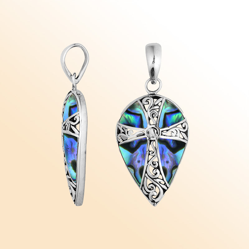 Sterling silver teardrop cross pendant with shimmering Abalone Shell – handcrafted Bali jewelry, a meaningful gift