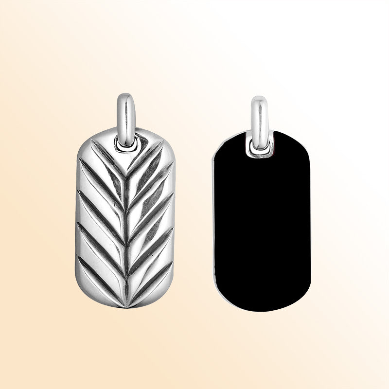 Sterling silver rectangular pendant with glossy black onyx inlay and chevron detailing, handcrafted Bali artisan jewelry necklace for modern everyday style.