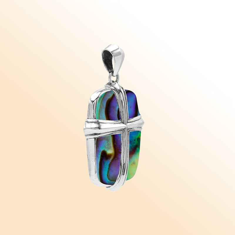 Sterling silver cross pendant with vibrant abalone shell inlay, handcrafted Bali jewelry with iridescent ocean-inspired colors.