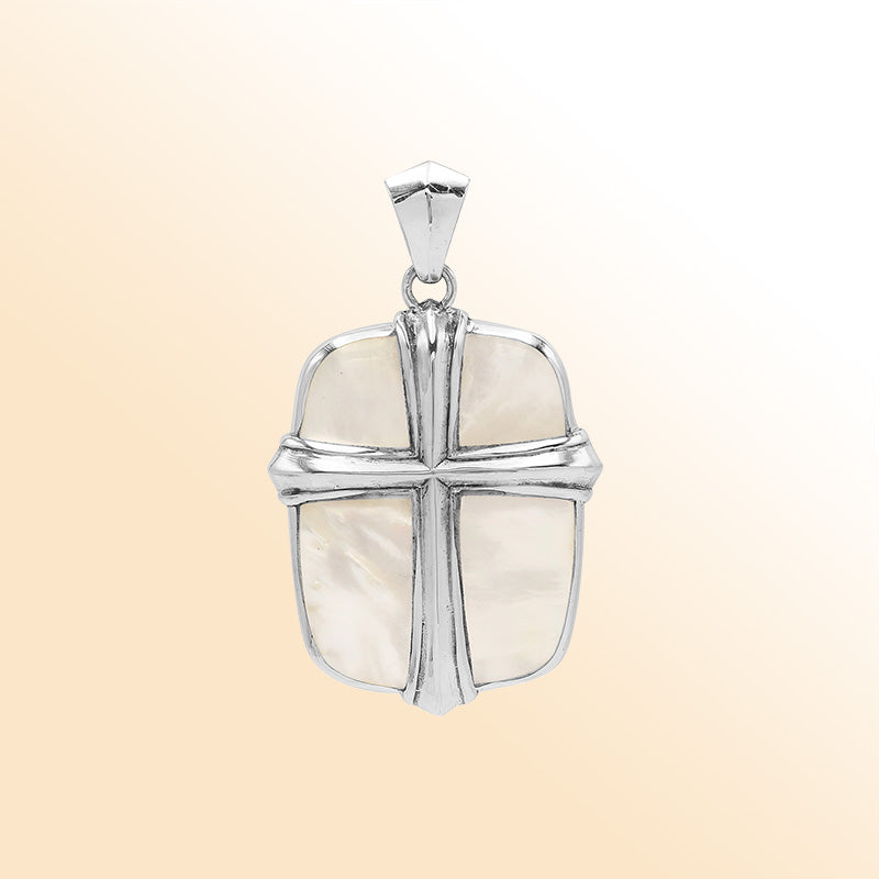 Sterling silver cross pendant with luminous mother of pearl shell inlay, handcrafted Bali jewelry with elegant natural shine.