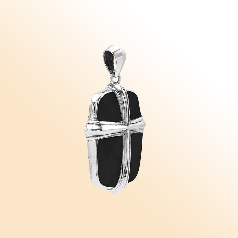 Handcrafted sterling silver cross pendant with glossy black shell inlay, elegant Bali artisan jewelry for everyday wear.