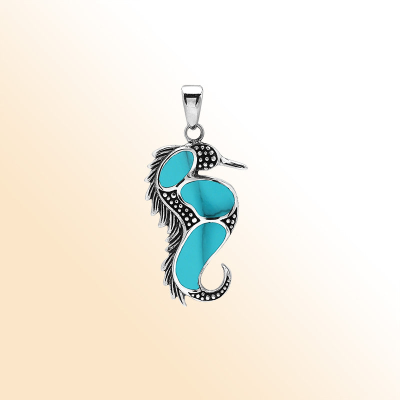 Sterling silver seahorse pendant with turquoise shell inlay, handcrafted Bali jewelry inspired by the ocean.
