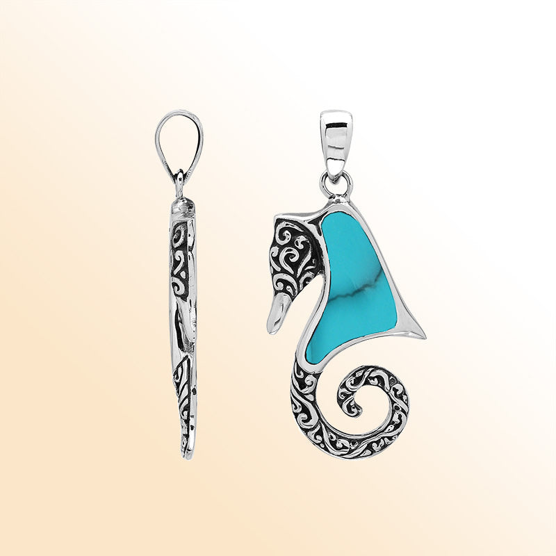 Sterling silver seahorse pendant with turquoise shell inlay, handcrafted in Bali.