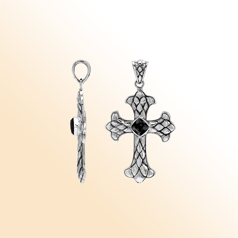 Black onyx cross pendant in sterling silver with handcrafted Balinese silverwork, spiritual artisan jewelry.
