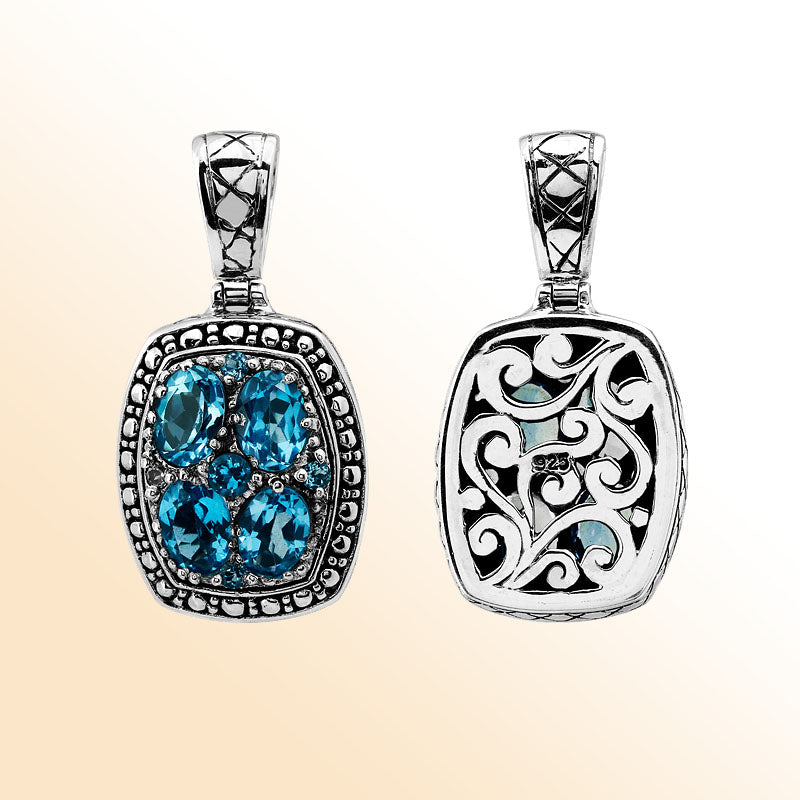 Handmade sterling silver pendant with Blue Topaz Quartz cluster and filigree swirl back design, artisan Bali jewelry.