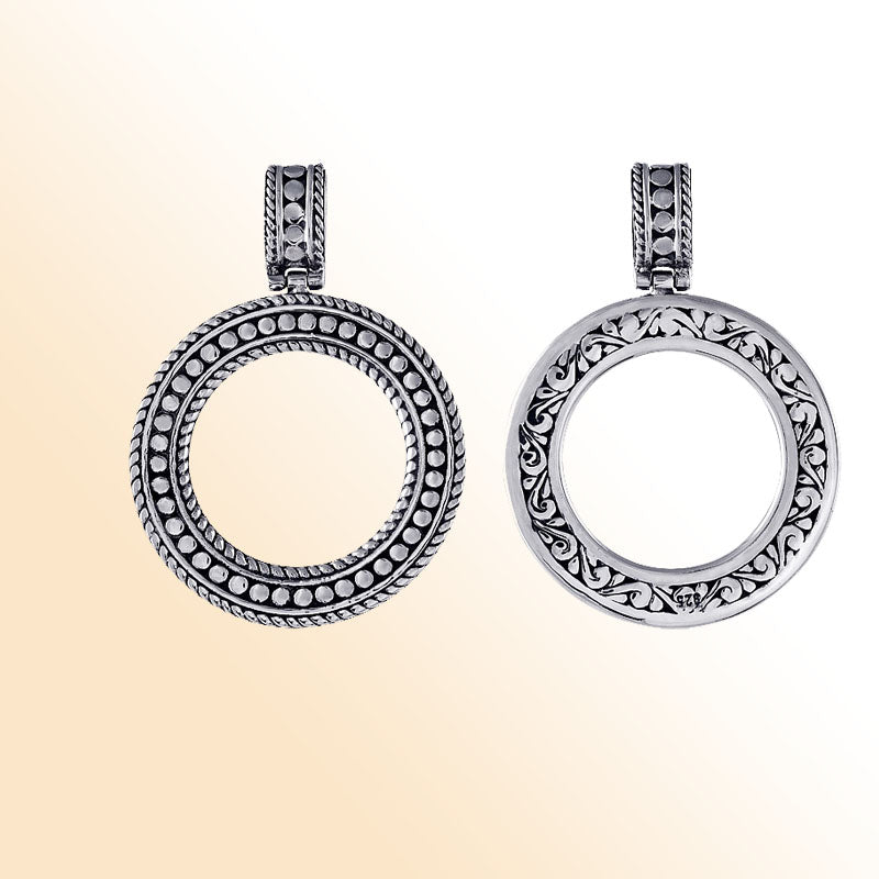 Handmade Bali silver circle pendant with reversible dotted and floral design