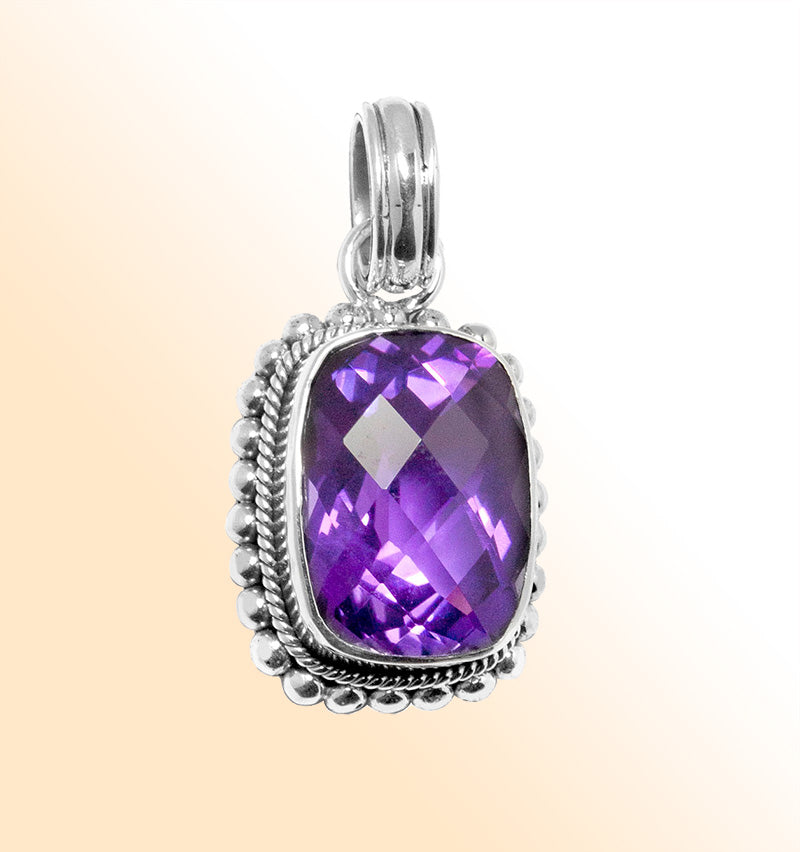 Handmade sterling silver pendant with faceted Amethyst Quartz, artisan crafted in Bali