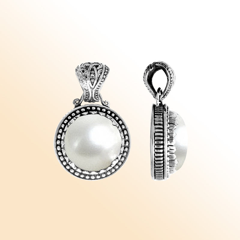 Handmade Pearl pendant in sterling silver with Balinese artistry, elegant jewelry design.